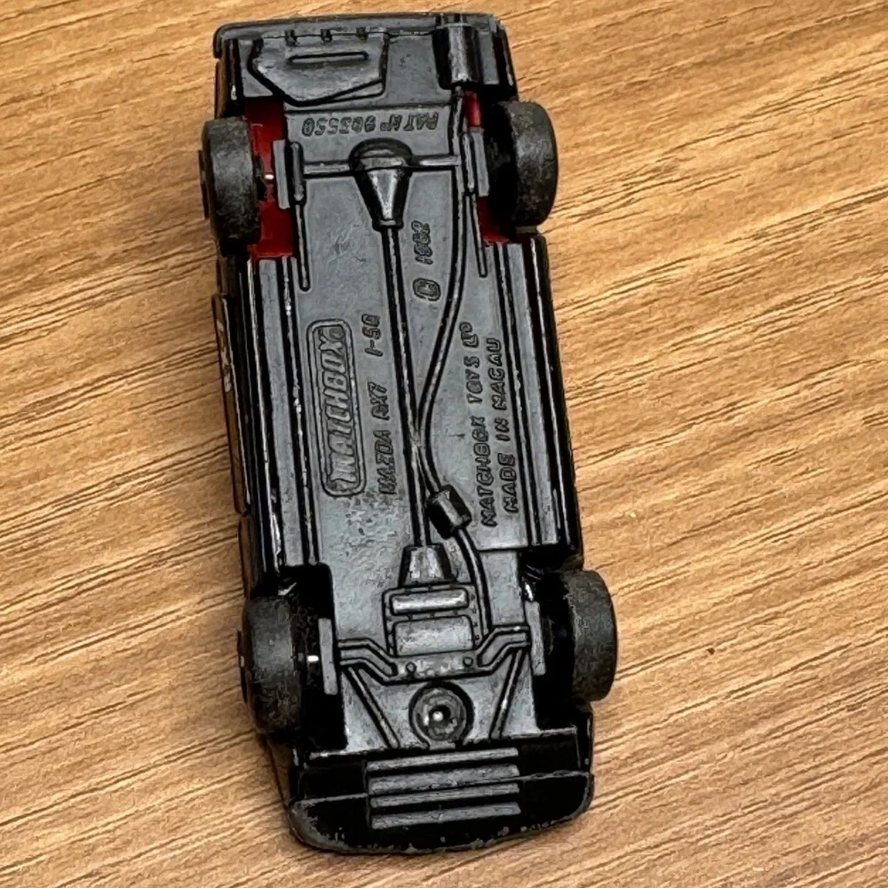 Vintage 1980s matchbox Mazda RX-7 Toy Car Black Diecast Collectible doors open‎